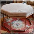 F32. West Elm octagonal cocktail ottoman. 